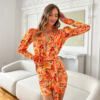 An adorable, decidedly feminine CHLOE dress with a fitted, ruffled bottom. Print in spring and summer flowers in intense orange tones. A Must Have for summer. LOVIN