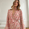 Dress made of delicate white viscose in a print of small roses. Lovin